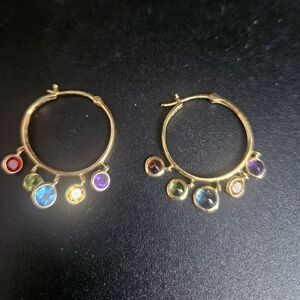Gold hoop earrings with semi precious stones.